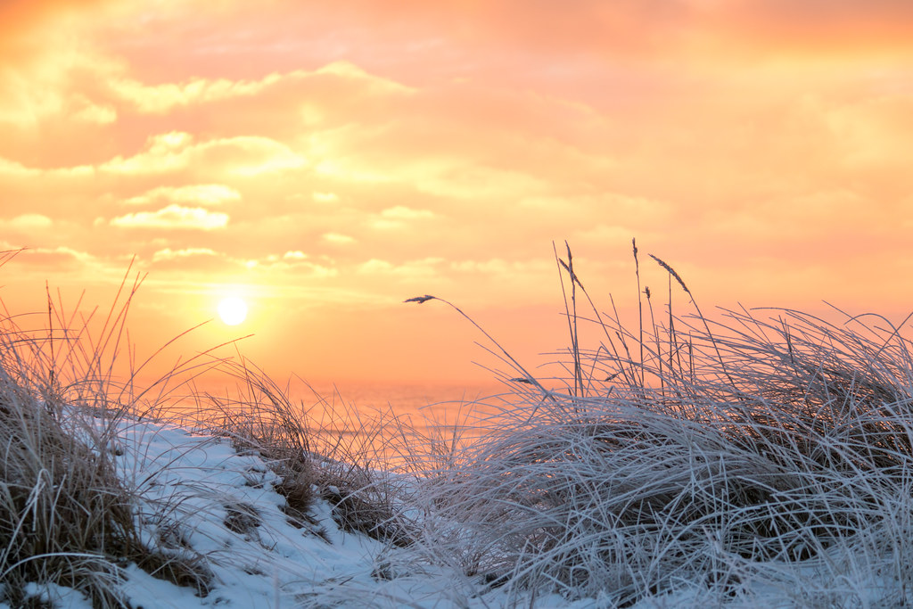 sunrise on snowy beach